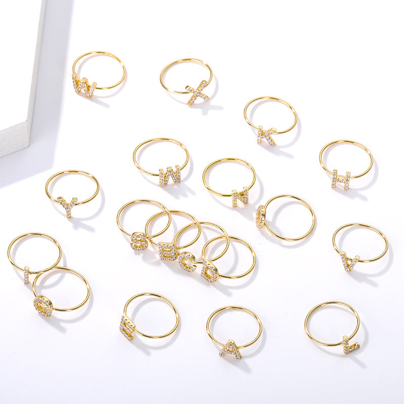Adjustable crystal letter ring