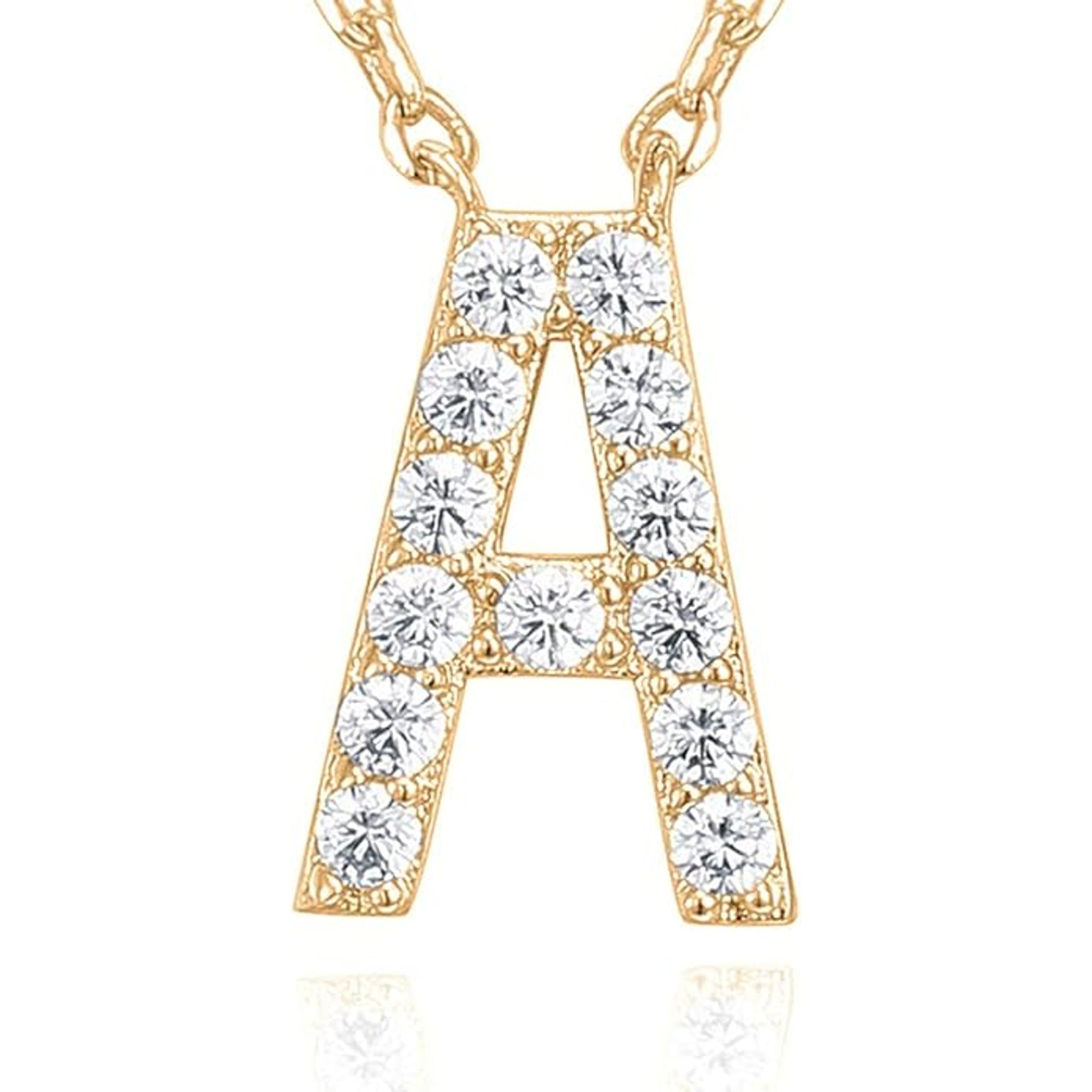 Crystal initial necklace in gold, close-up - Pulse and Glow