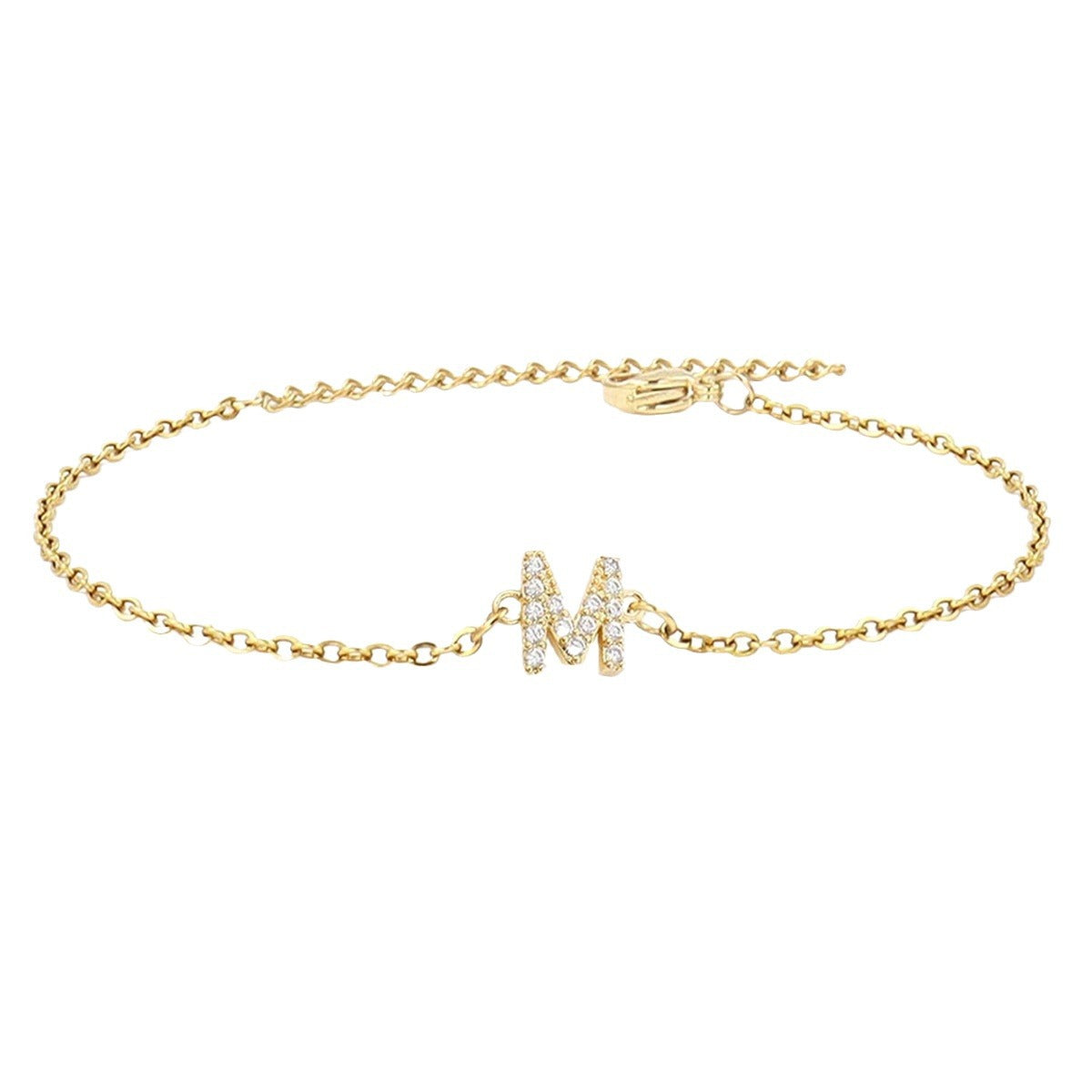 Crystal initial bracelet worn on the wrist in natural light