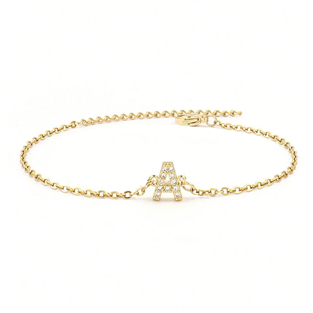Crystal initial bracelet shown flat on a plain background